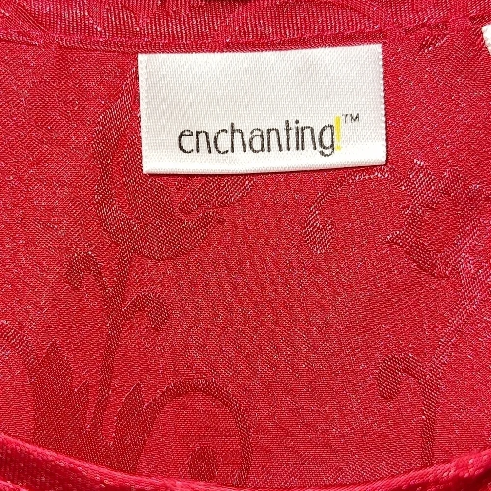 A Set of Enchanted Red Silky ladies pajamas in a large (14-16). EUC.